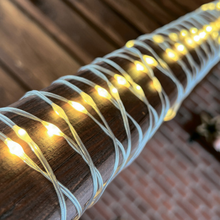Гирлянда-нить св/д "Полоса" 100 светодиодов, теплый белый свет, провод прозрач 10м IP20 Uniel 